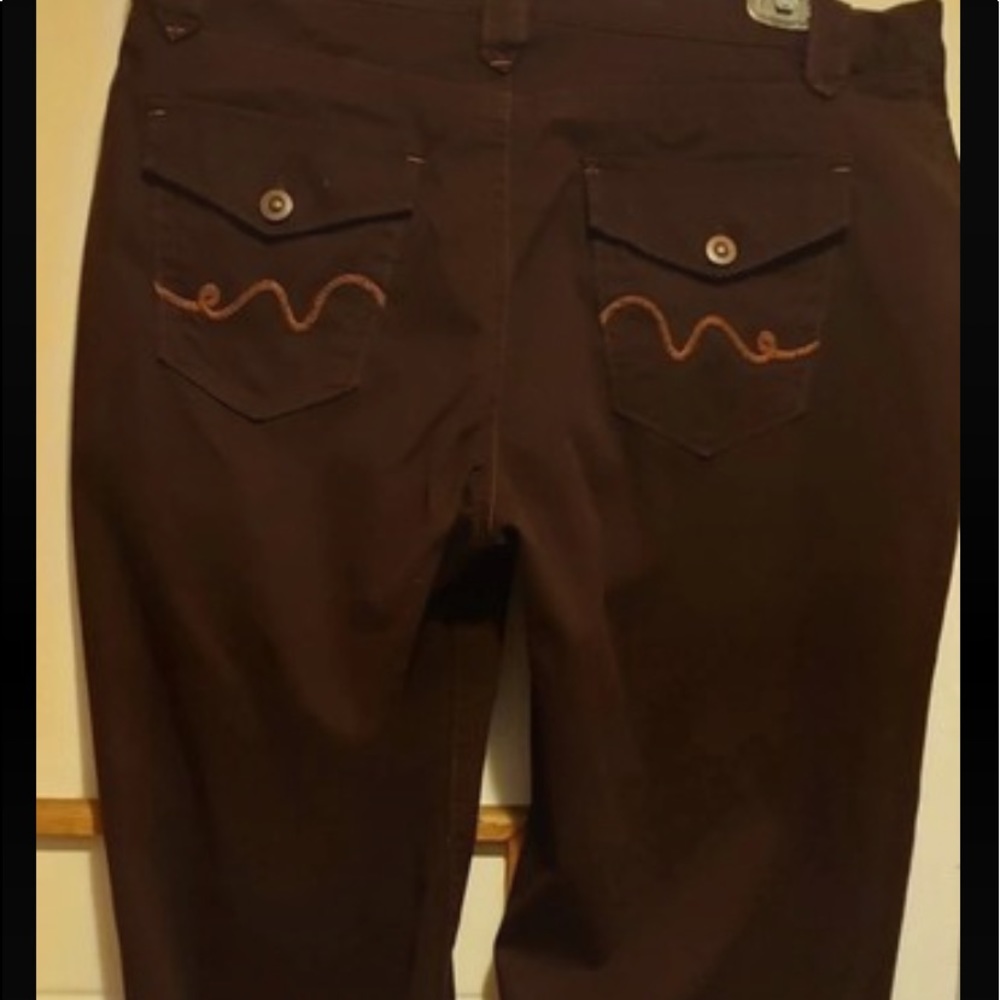 Vintage brown jeans with snap flap pockets